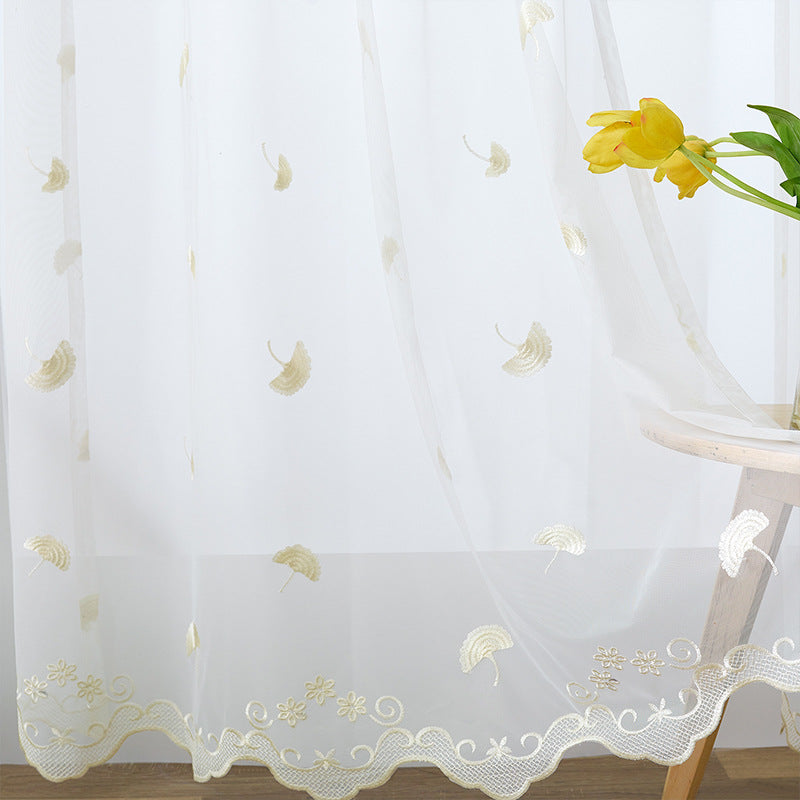 Transparent curtain drape made of fine tulle with embroidered ginkgo leaves and curved lace finish Stornfield