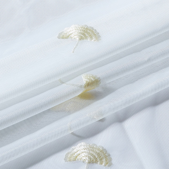 Transparent curtain drape made of fine tulle with embroidered ginkgo leaves and curved lace finish Stornfield