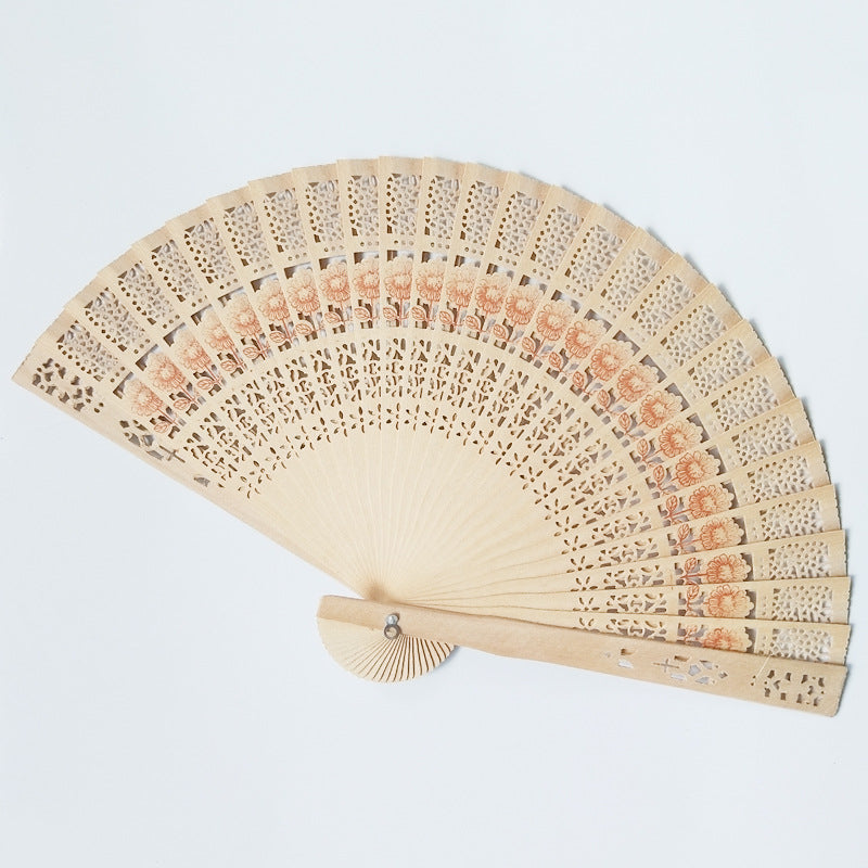 Ladies decorative hand fan made of high-quality wood with intricate cut-out work Stornfield