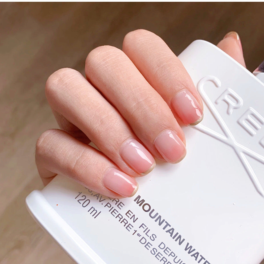 Artificial nails with glitter accents and natural finish Stornfield