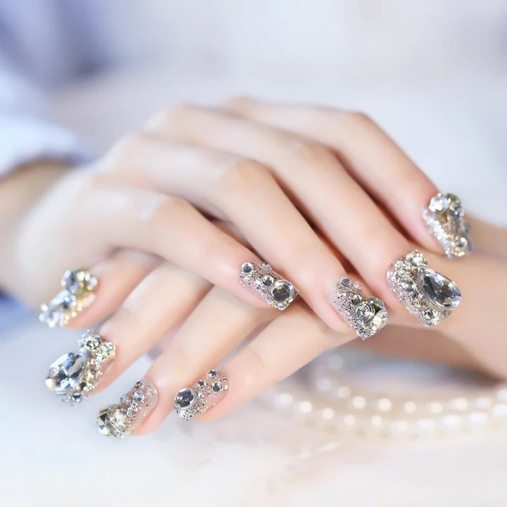 Nail art with glamorous rhinestone and glitter design Stornfield