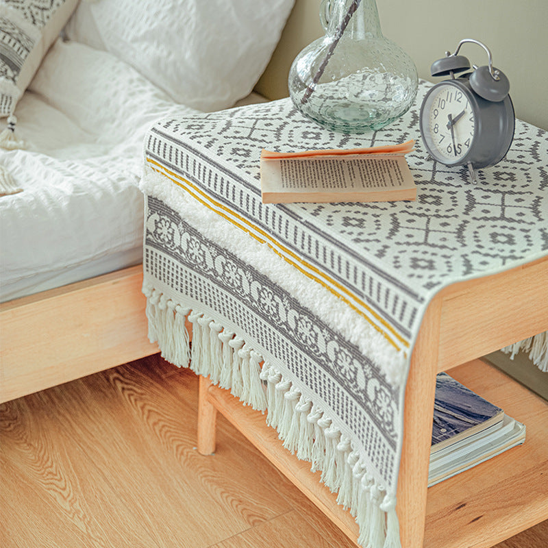 Handwoven cotton runner in Scandi-Boho style with fringes and geometric diamond jacquard Stornfield