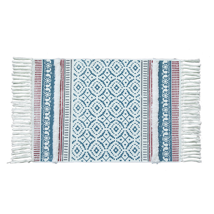 Woven bed runner made of cotton blend with flat weave, low pile and decorative fringed edge