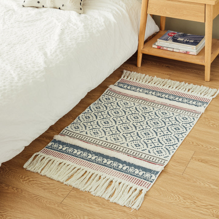 Handwoven cotton runner in Scandi-Boho style with fringes and geometric diamond jacquard Stornfield