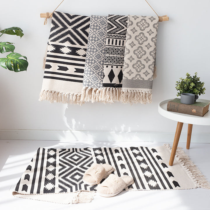 Flat-woven cotton runner with Mediterranean tile jacquard and decorative fringes Stornfield