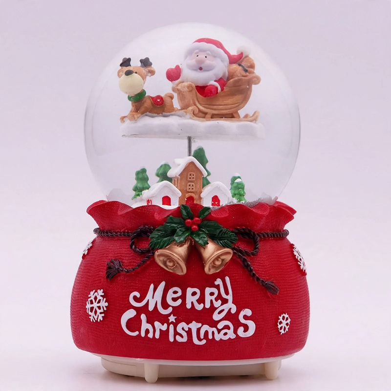 Christmas music box with glass sphere and snow effect