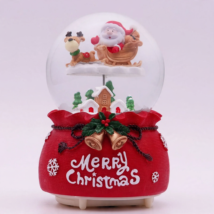 Christmas music box with glass sphere and snow effect