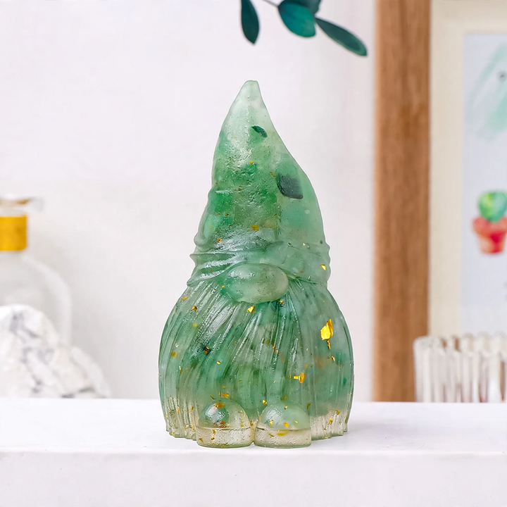 Dwarf figure made of resin with gemstones