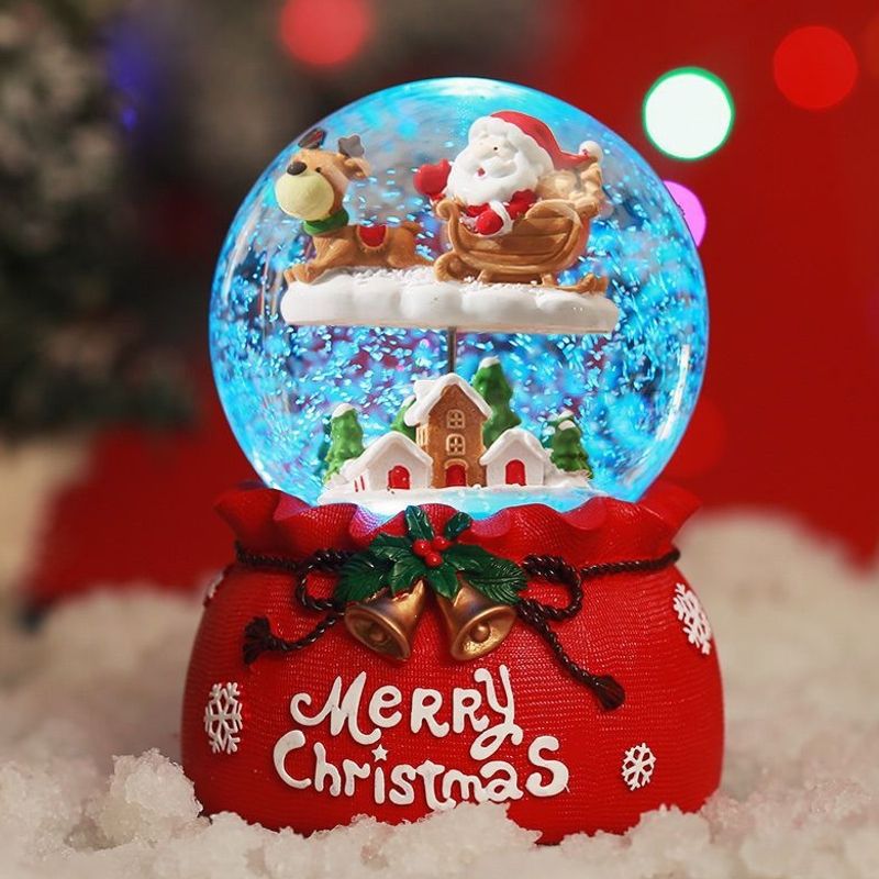 Christmas music box with glass sphere and snow effect