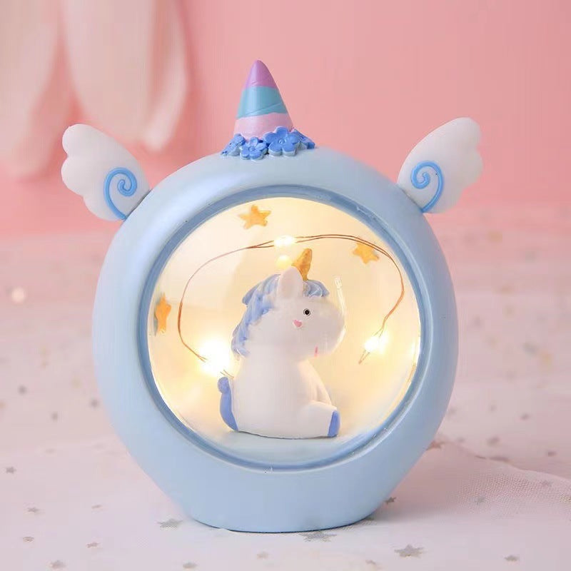 Decorative animal figure with pencil holder and light