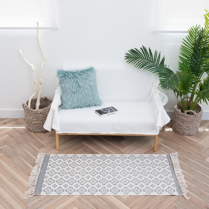 Flat-woven cotton runner with Mediterranean tile jacquard and decorative fringes Stornfield