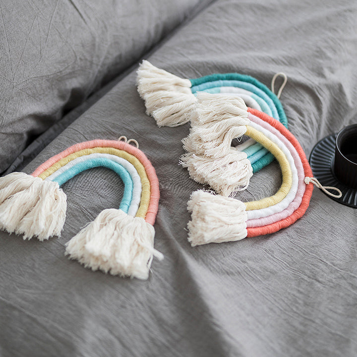 Macrame wall hanging in rainbow shape, handcrafted cotton yarn decorative element Stornfield