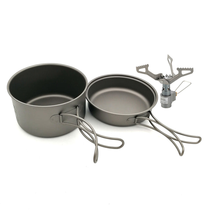 ultra-light titanium backpacking cook set with nesting pots, non-stick finish, foldable handles and compact micro gas burner Stornfield
