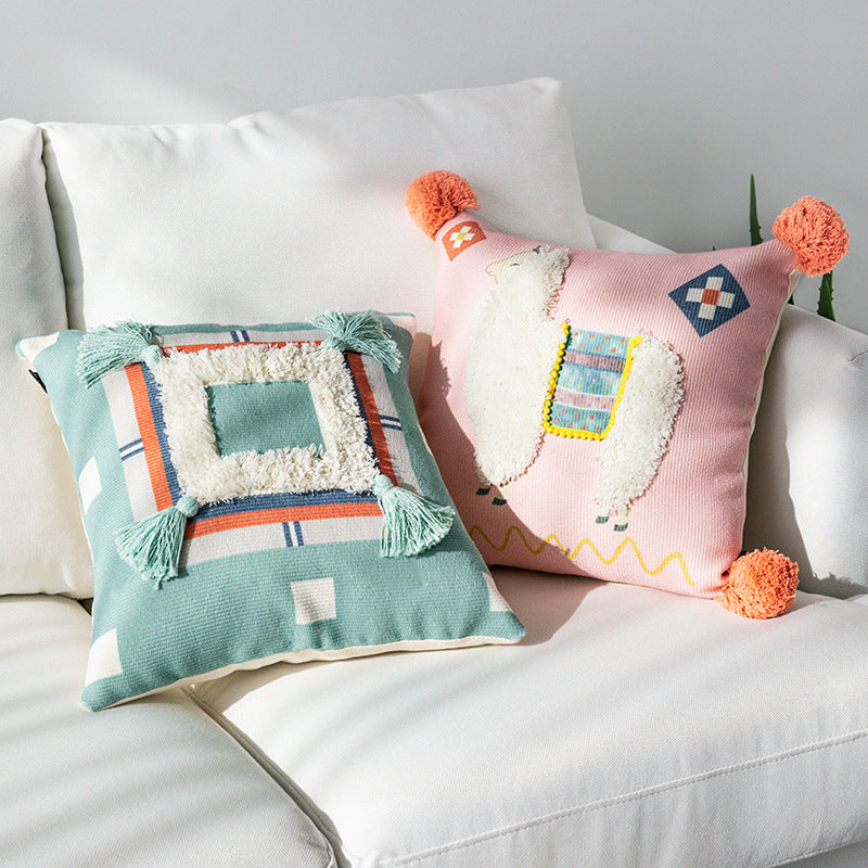 Square Boho decorative pillow with crocheted pom-pom and decorative corner tassels