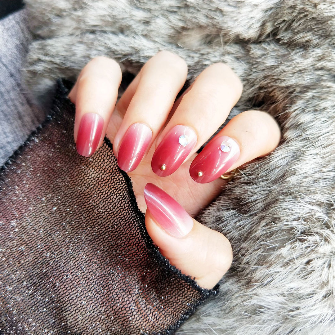 Artificial nails with elegant ombre effect and rhinestone decorations Stornfield