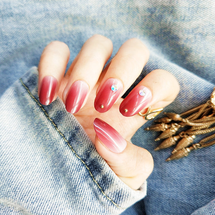 Artificial nails with elegant ombre effect and rhinestone decorations Stornfield