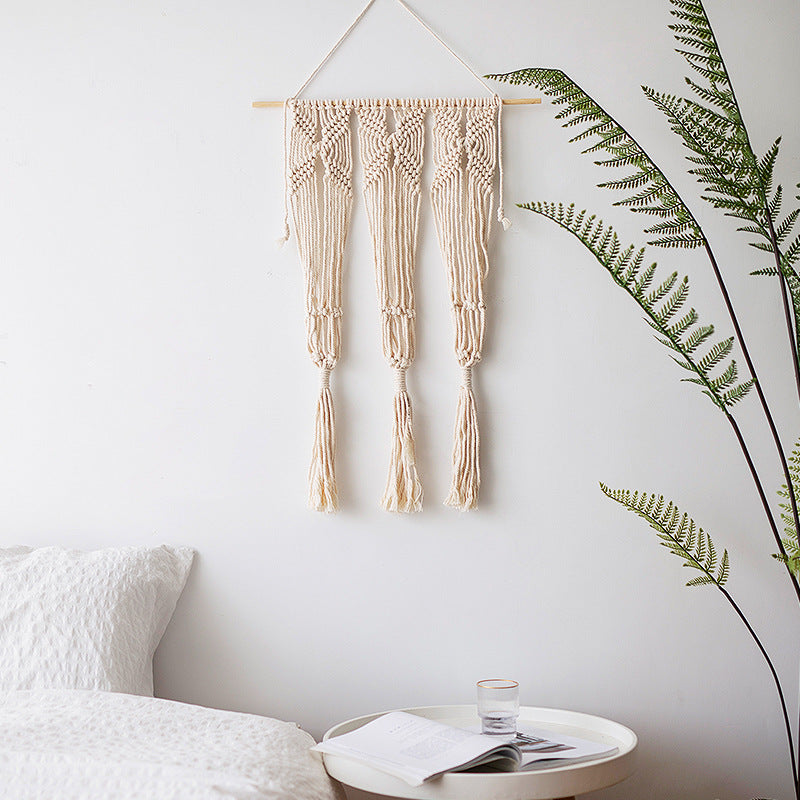 Macramé wall hanging with geometric triple tassel design and wooden rod Stornfield