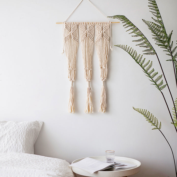 Macramé wall hanging with geometric triple tassel design and wooden rod Stornfield