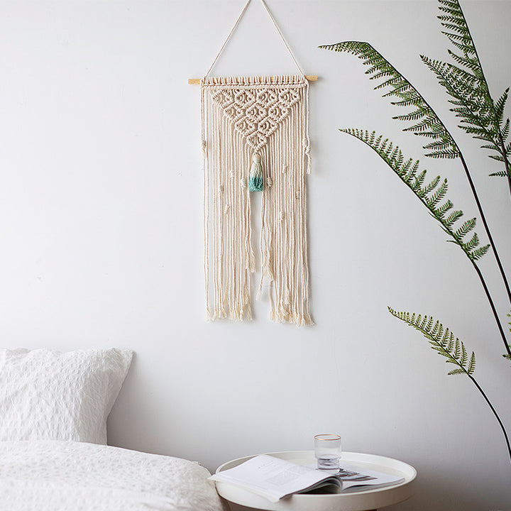 Macramé wall hanging with geometric triple tassel design and wooden rod Stornfield