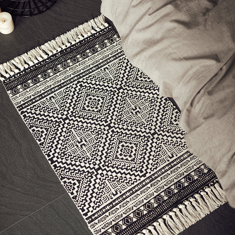Flat-woven cotton runner in Boho-Tribal design with geometric diamond patterns and hand-fringed edge