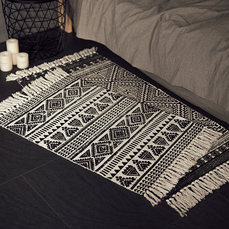 Flat-woven cotton blend runner with ethnic diamond jacquard and fringes Stornfield