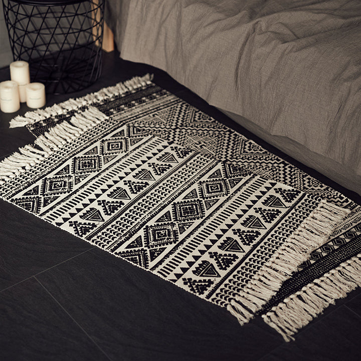 Flat-woven cotton blend runner with ethnic diamond jacquard and fringes Stornfield