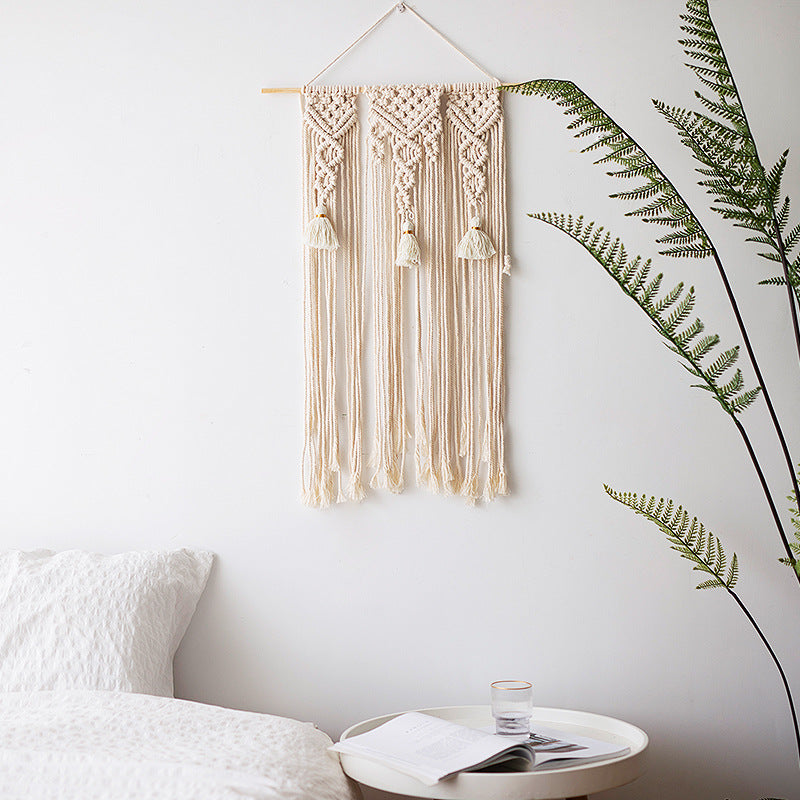 Macramé wall hanging with geometric triple tassel design and wooden rod Stornfield