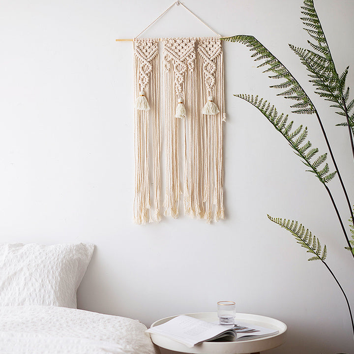 Macramé wall hanging with geometric triple tassel design and wooden rod Stornfield