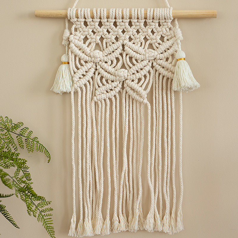 Macramé wall hanging with geometric triple tassel design and wooden rod Stornfield
