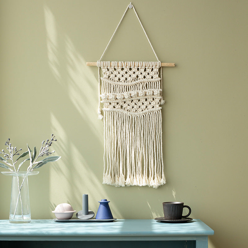 Macramé wall hanging with geometric triple tassel design and wooden rod Stornfield