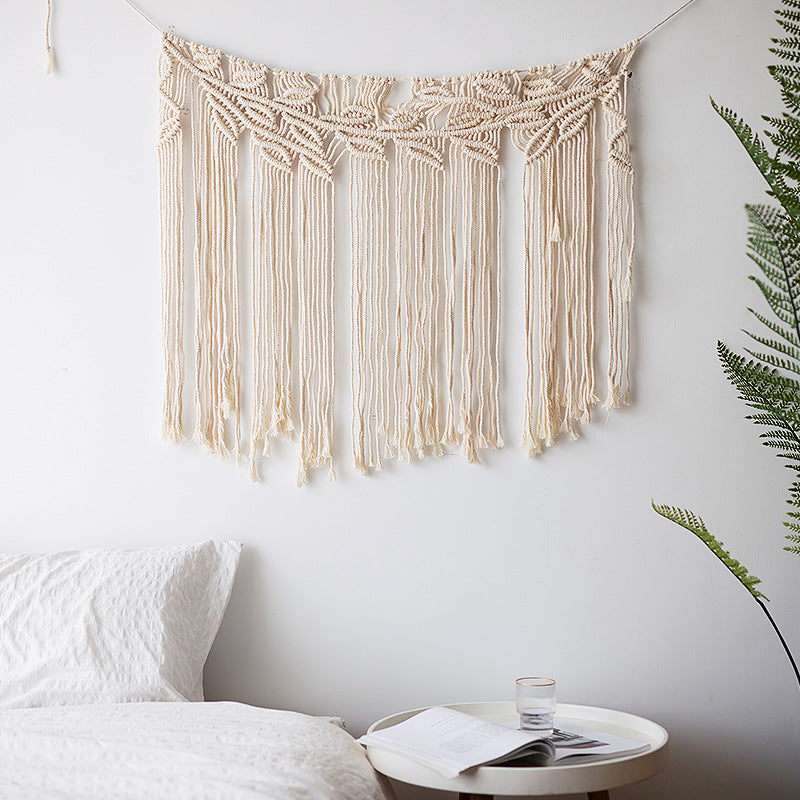 Macramé wall hanging with geometric triple tassel design and wooden rod Stornfield