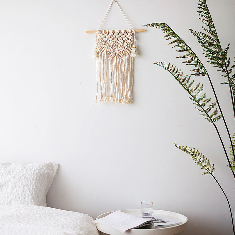 Macramé wall hanging with geometric triple tassel design and wooden rod Stornfield
