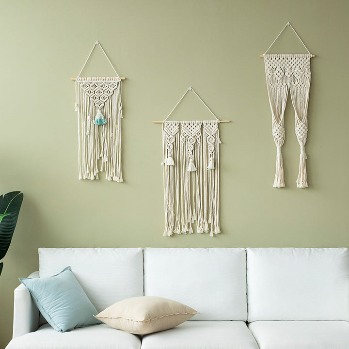 Macramé wall hanging with geometric triple tassel design and wooden rod Stornfield