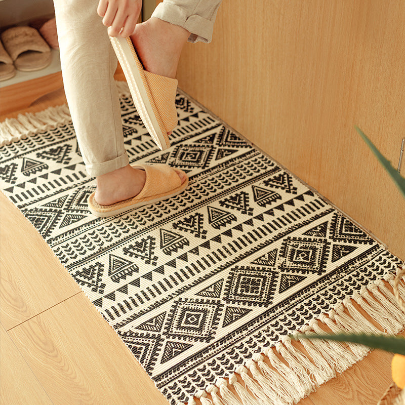 Flat-woven cotton blend runner with ethnic diamond jacquard and fringes Stornfield