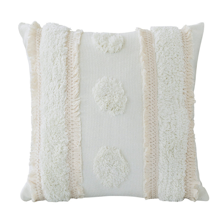 Decorative cushion cover with hand-tufted texture and fringe application