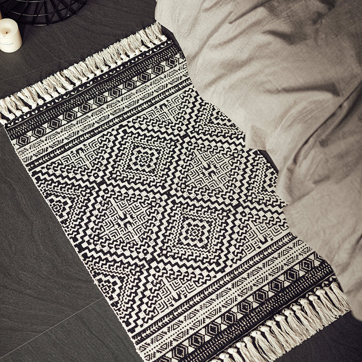 Flat-woven cotton blend runner with ethnic diamond jacquard and fringes Stornfield