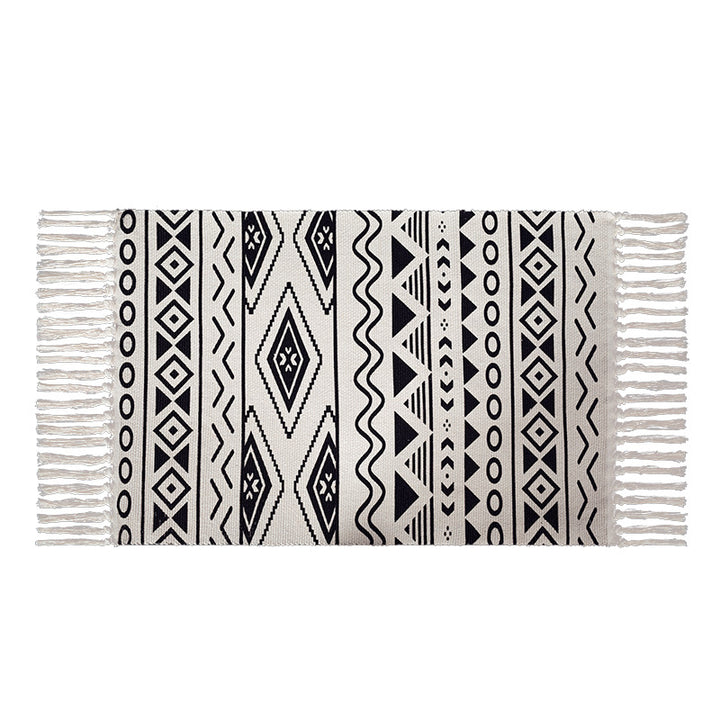Flat-woven cotton blend runner with ethnic diamond jacquard and fringes Stornfield