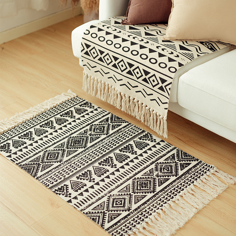 Flat-woven cotton blend runner with ethnic diamond jacquard and fringes Stornfield