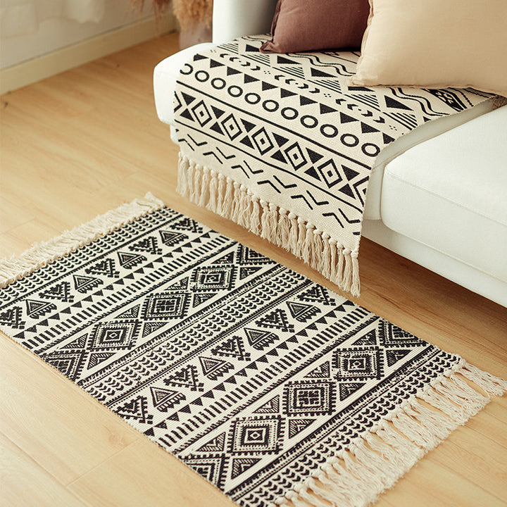 Flat-woven cotton blend runner with ethnic diamond jacquard and fringes Stornfield