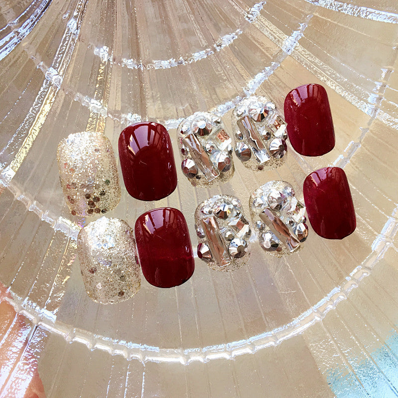 Nail art with luxurious glitter and floral design Stornfield