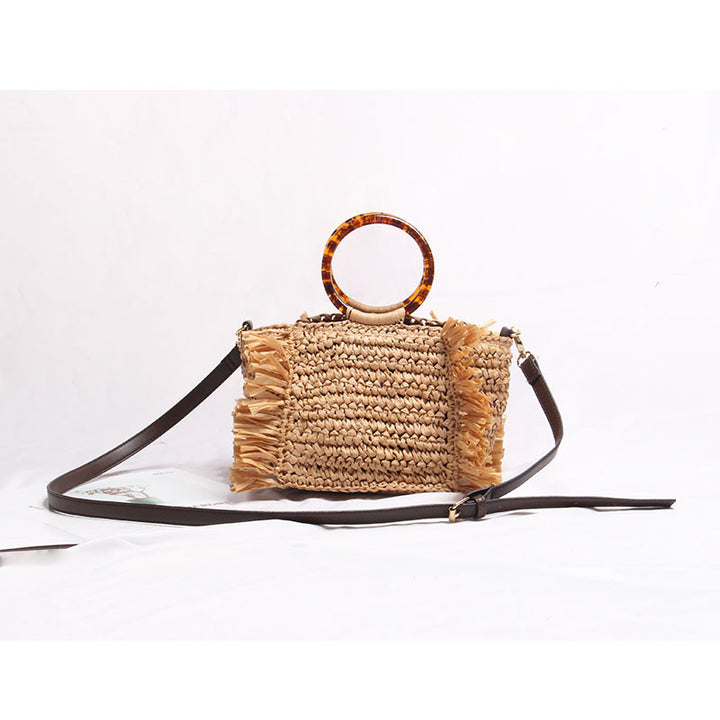 Handmade raffia shoulder bag with fringed accents Stornfield