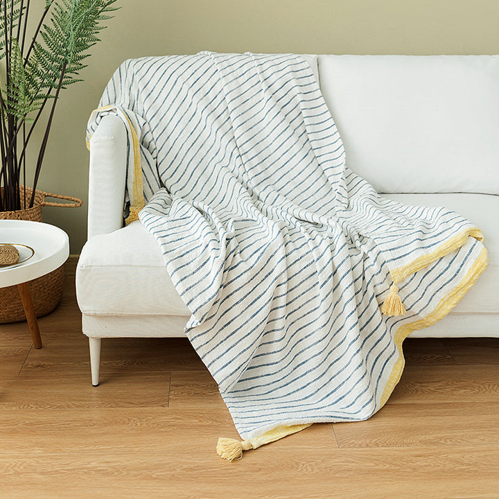 Light striped cotton throw blanket with fringes and textured knot appliqué Stornfield
