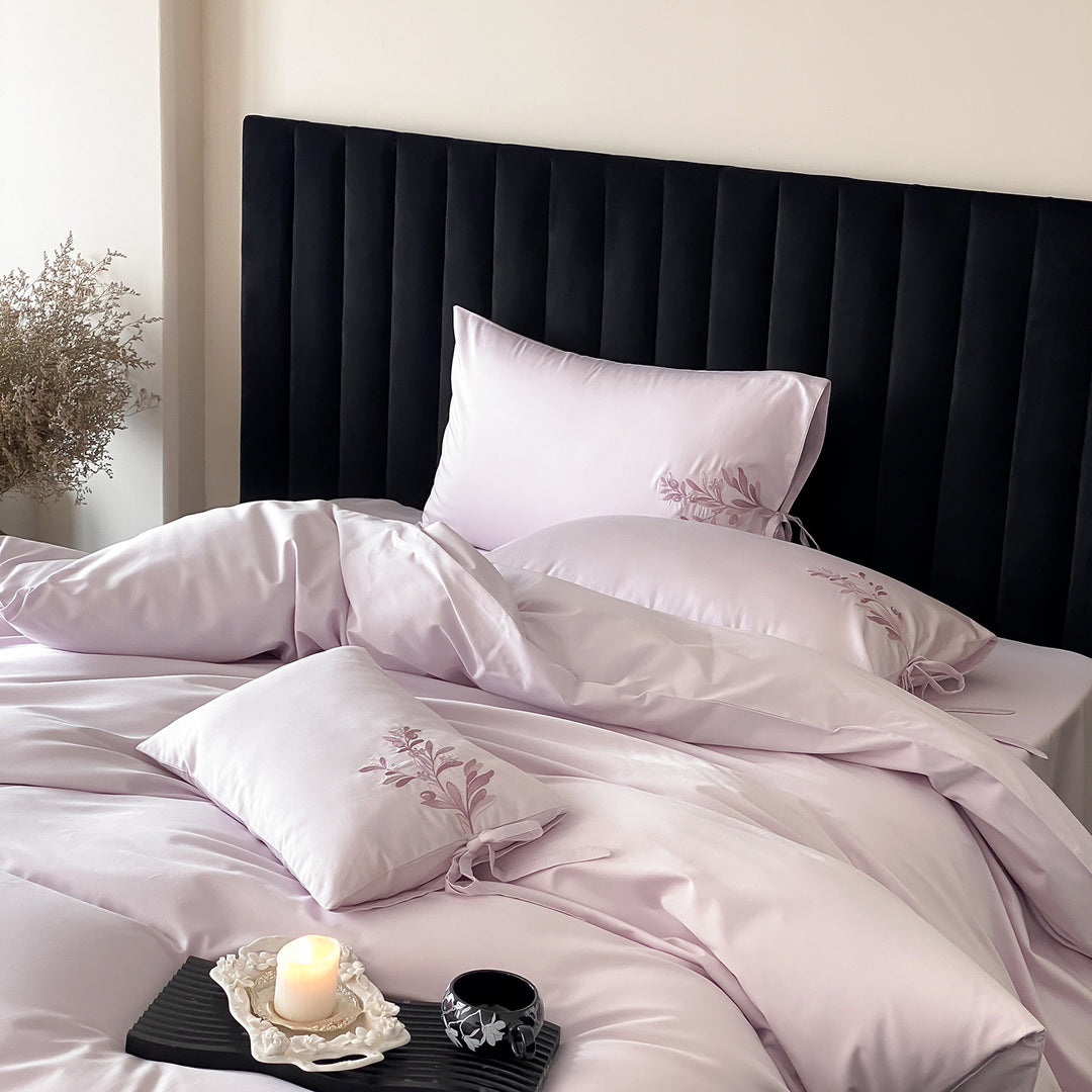 Embroidered cotton bedding with floral design