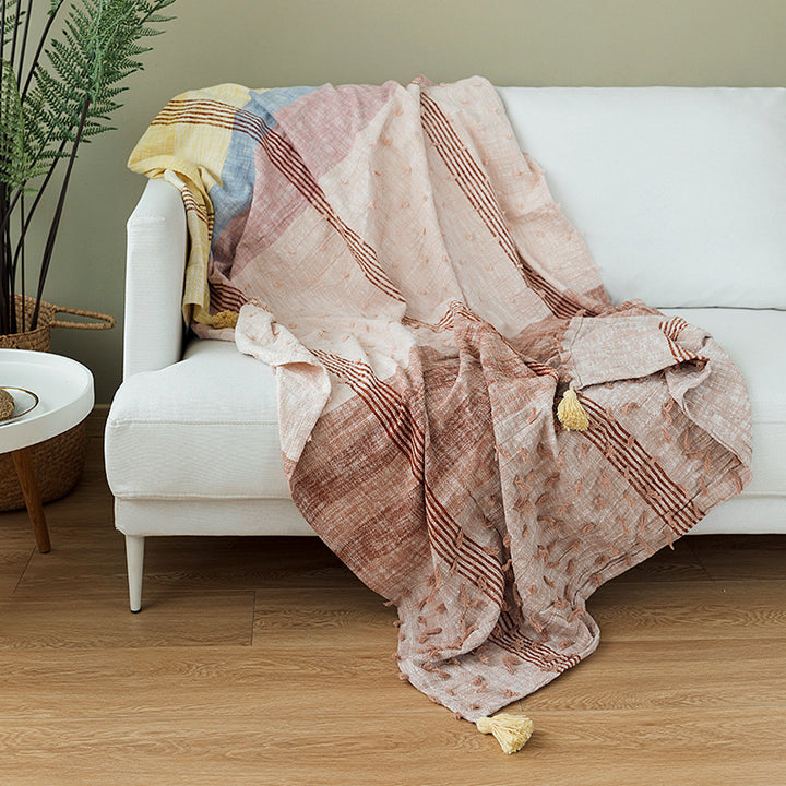 Light striped cotton throw blanket with fringes and textured knot appliqué Stornfield