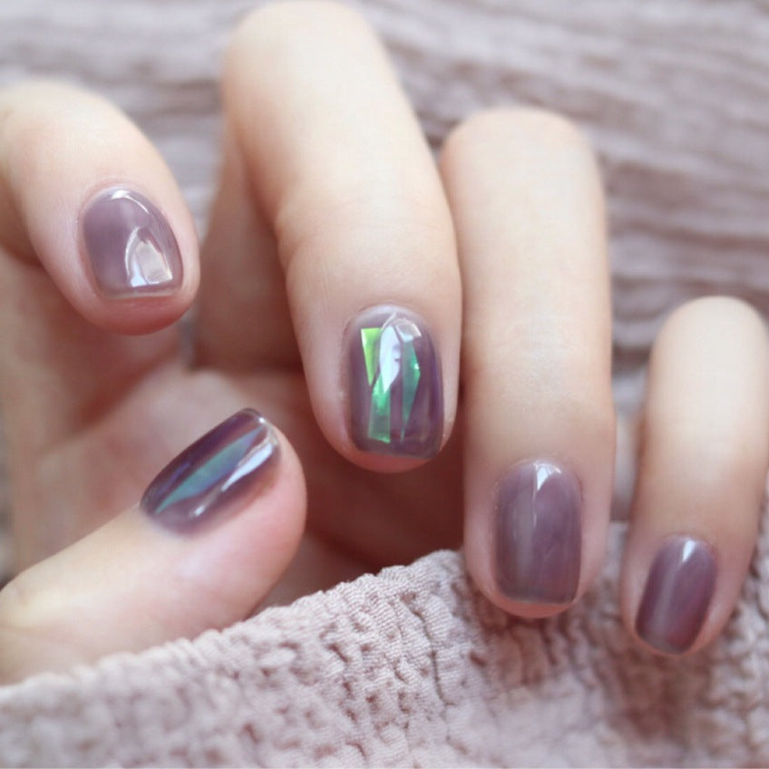Artful nail extensions with an elegant leaf pattern Stornfield