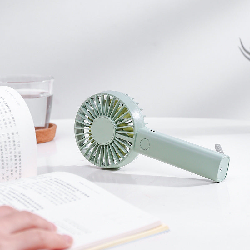 Unisex nan compact portable hand fan with rechargeable battery and USB charging port quiet operation self-standing Stornfield