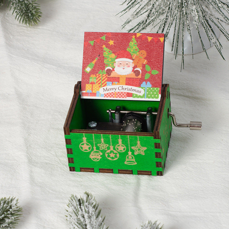 Manual wooden music box with crank