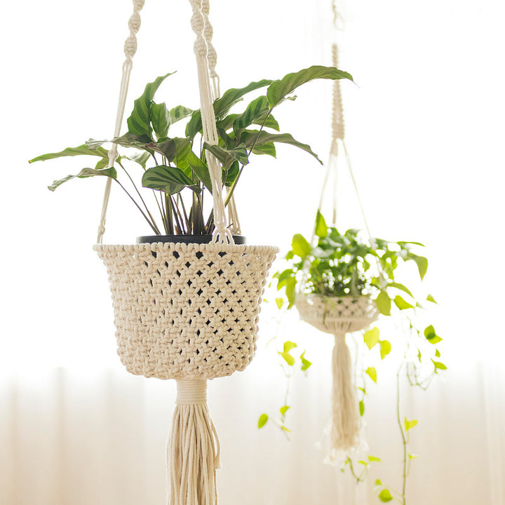 Macrame plant hanger made of cotton rope with tassels and adjustable suspension Stornfield
