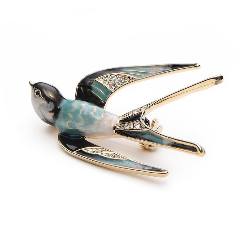 Ornate Bird-Inspired Enamel Brooch Stornfield