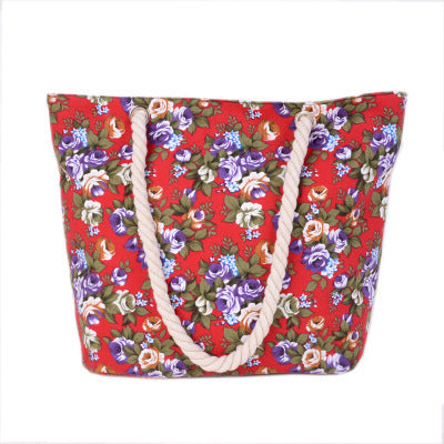 Beach bag with sturdy rope handles and floral details Stornfield